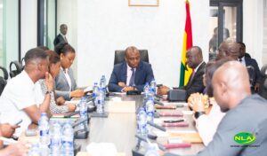 Deputy Minister of Finance, Thomas Nyarko Ampem interracts with the newly inaugurated members of the NLA governing board