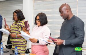 Members of the board taking their oaths of office