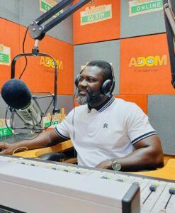 Mike 2 at work in the studio of Adom FM