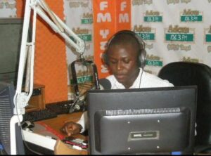 Where it all started: Eric Asiedu Boadi behind the Adom FM console during the Adom Star reality context