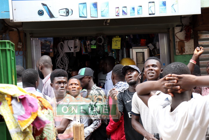 Traders inspect their looted shops at Circle after clash between Ghanaians and Nigerians