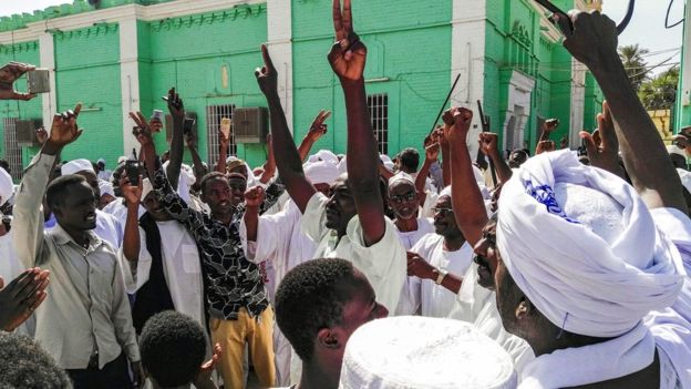 Sudanese protesters chant slogans against President Omar al-Bashir in Omdurman. File photo