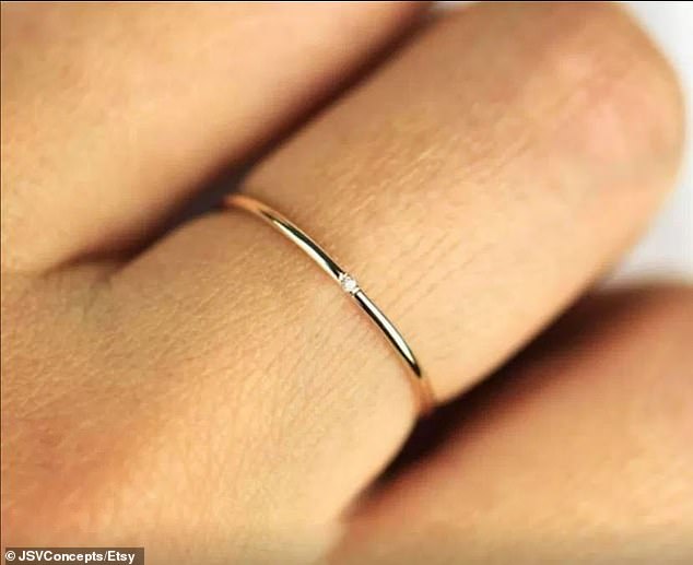 The 'Minimalist' ring (pictured) the woman shared to Facebook featured a single diamond set within a 14k gold band