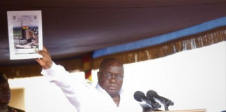 Akufo Addo with the cover documen