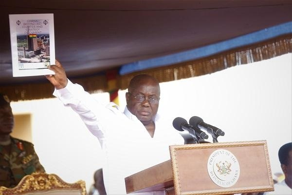 Akufo Addo with the cover documen