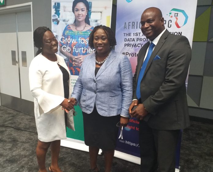 Data Protection Commissioner, Patricia Edusei-Poku (middle), flanked by Rita Tsegah and Roland Gyan from Ecobank
