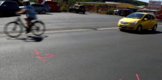 Police markings on the road where the bullets had been fired
