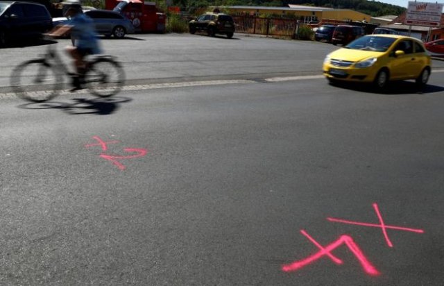 Police markings on the road where the bullets had been fired