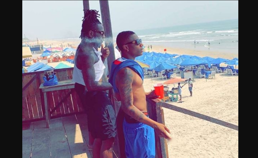 Nigerian musicians, Burna Boy and Wizkid chilling at Accra's Labadi Beach 