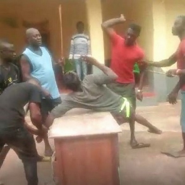 The young man captured being beaten for flouting the chief’s orders