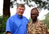 Bible translator Angus Fung (R) poses for a photo with Tearfund Canada President Wayne Johnson (L) in Wum, Cameroon