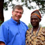 Bible translator Angus Fung (R) poses for a photo with Tearfund Canada President Wayne Johnson (L) in Wum, Cameroon