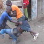 Video: Two grown men fight over a woman