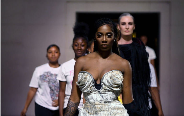 Tiwa Savaged Black Porn - Tiwa Savage walks the runway for Naomi Campbell's 'Fashion For ...