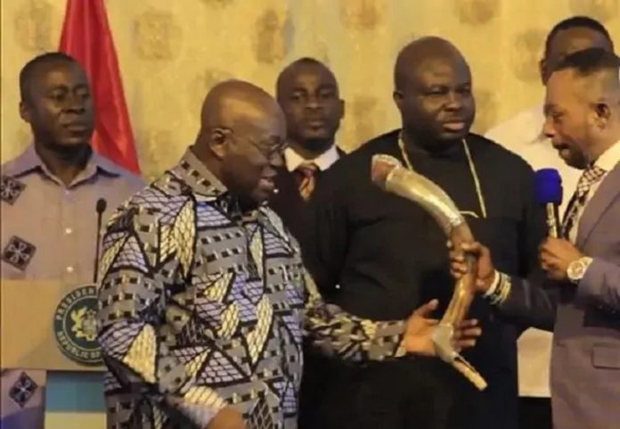 Rev Owusu Bempah presents 'horn of strength' to Akufo-Addo in March 2017