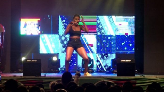 An energised Vanessa Nice performing on stage