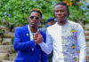 Shatta Wale (L) and Stonebwoy smoke the peace pipe