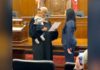 Judge holds baby as mom is sworn in as lawyer