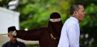 Mukhlis reacts as he is punished in public