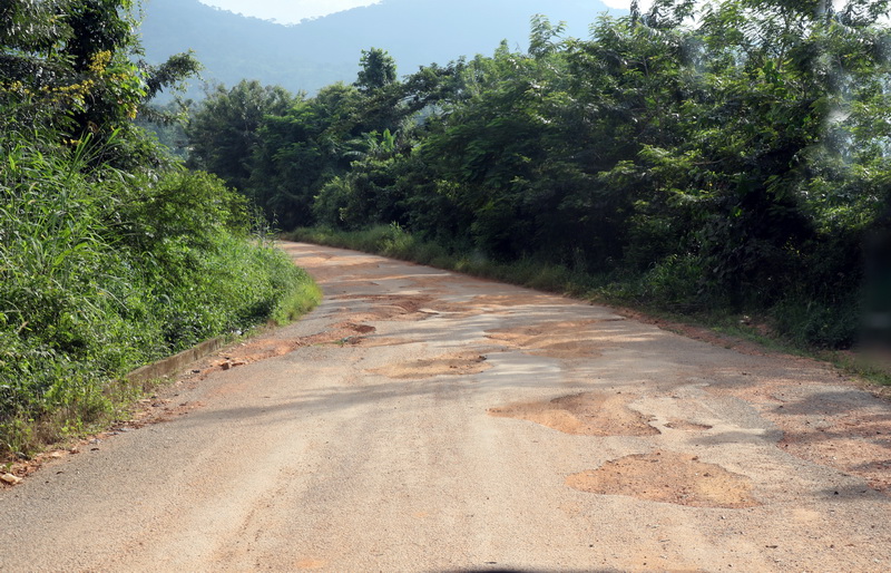 Sharp curve with deep potholes at Lekpe at Afadjato