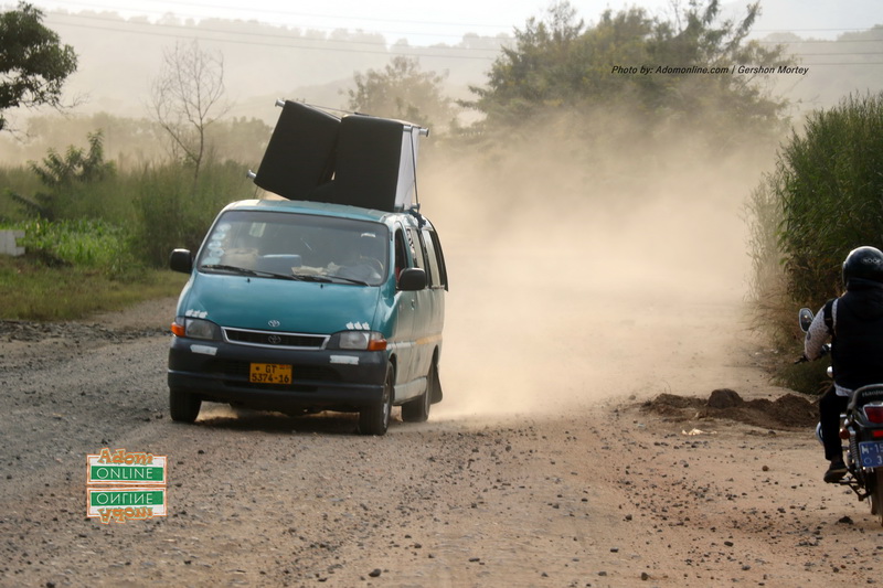 Dust engulfs road from Peki, Todome to Have.