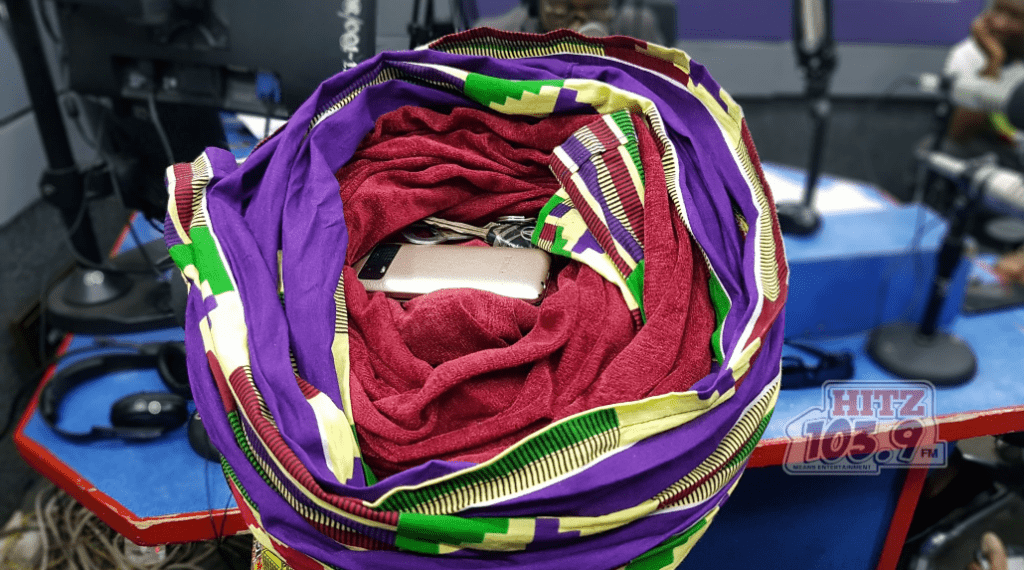 Akumaa Mama Zimbi keeps her car keys, mobile phone in her headgear