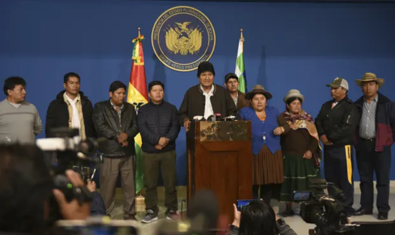 The Bolivian president, Evo Morales, makes a speech at the presidential hangar in El Alto on Sunday. Photograph: Enzo De Luca/AP