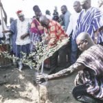 President Akufo-Addo (with a shovel) planting a tree for commencement of work on the Pwalugu Multipurpose Dam