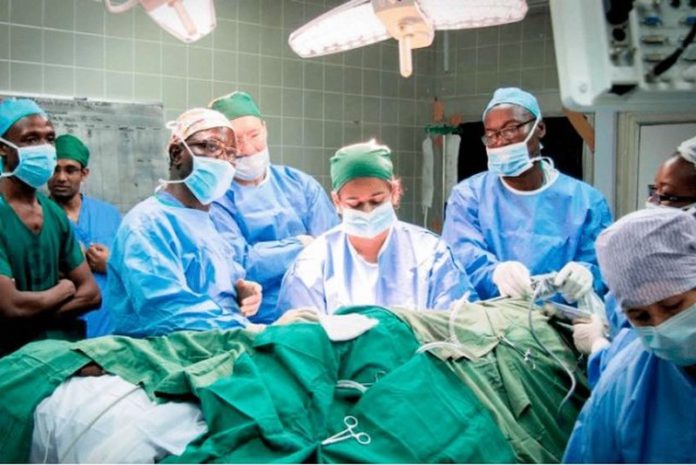 The medical team doing a kidney transplant on one of the patients