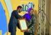 MTN Ghana CEO, Selorm Adadevoh presenting the award to George Andah