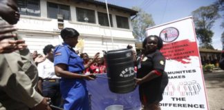 Sex workers donate items to police (Photos/Kipsang)