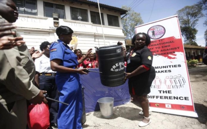 Sex workers donate items to police (Photos/Kipsang)