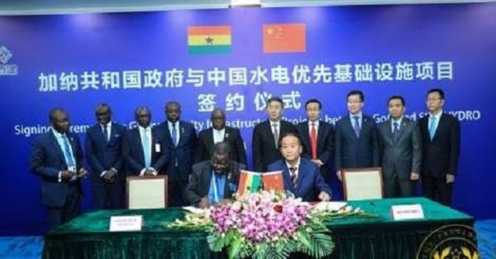 Officials of Ghana and China present at the Sinohydro trade deal signing