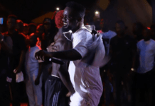 Sarkodie hugs Bosom Pyung at a concert in Ghana in 2019