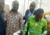 Forrmer District Finance Officer for sefwi Akontombra assembly Isaac Akowuah and the Current Officer James Esilfie in handcuffs being taken away by the police
