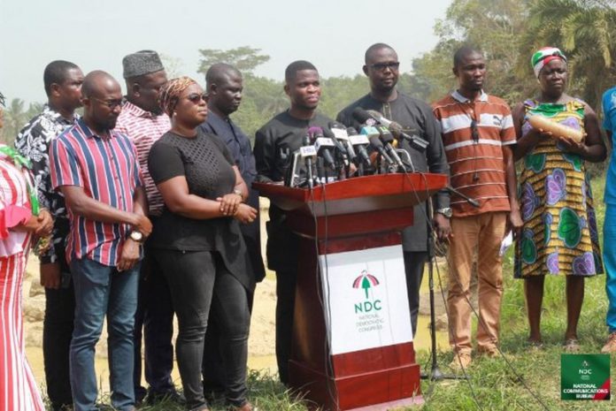 NDC addressing the press at the bank of River Pra
