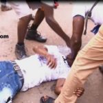 An injured man being attended to.