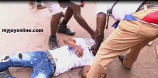 An injured man being attended to.