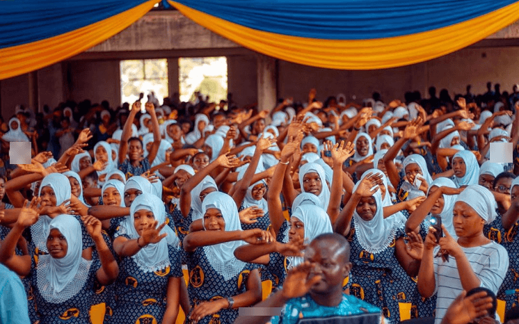 Strongman donates educational materials to alma mater