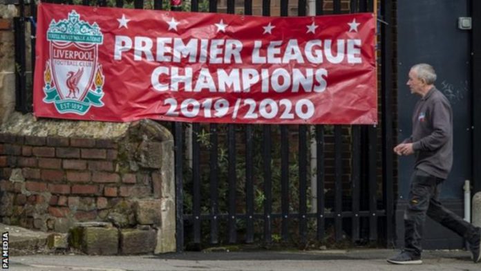 Liverpool are two wins from making this banner reality