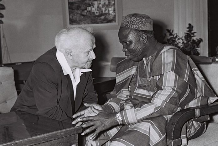 Chief S L Akintola Prime minister of western Nigeria in conversation with the prime minister of Isra