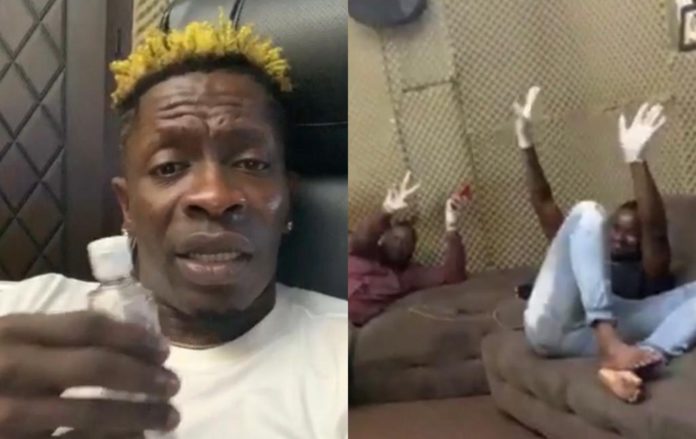 Shatta Wale patronises hand sanitisers; enforces people who visit him will wear gloves