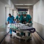 Pursue wellness rather than curing illness – Doctor Doctors attending to a patient