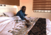Shatta Wale shows off his money in bed