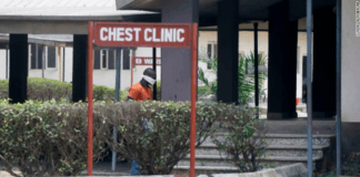 A man wearing face mask walks at the Yaba Mainland hospital, where an Italian citizen who entered Nigeria from Milan on a business trip, the first case of the COVID-19 virus, was treated in Lagos, Nigeria.