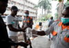 A security guard administering sanitizer to a hospital visitor in Lagos, Nigeria, on Friday.Credit...Pius Utomi Ekpei/Agence France-Presse — Getty Images
