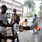 Coronavirus: Nigeria records 34 new cases A security guard administering sanitizer to a hospital visitor in Lagos, Nigeria, on Friday.Credit...Pius Utomi Ekpei/Agence France-Presse — Getty Images