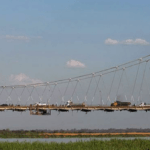 Lorry in Mozambique found with 64 dead stowaways The lorry was found in Moatize, near this bridge crossing the Zambezi river