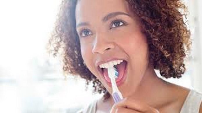 brushing of teeth and tongue