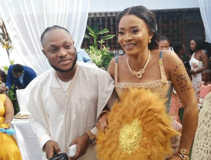 Keche Andrew and his wife Joana during their wedding | Photo: @joanagyancudjoe/ Instagram